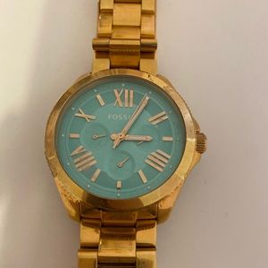 Teal Fossil stainless steel watch